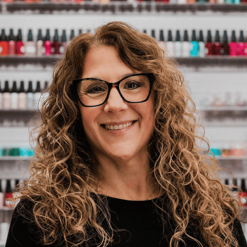 Portrait of Lisa Rearick, a professional stylist at A Finished Appearance, showcasing their expertise and style.