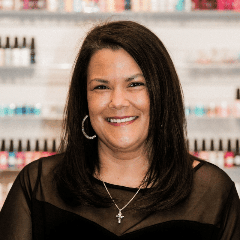 Portrait of Amanda Raybets, a professional stylist at A Finished Appearance, showcasing their expertise and style.